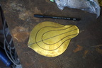 8. The brass piece has been cut out, annealed and pickled, and lines drawn on it as guides for hammering.