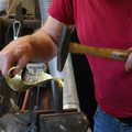 8. forming a V-trough on a V-shaped stake.