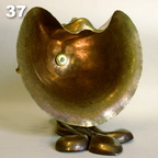 37. Showing how the bell is attached, with custom made extra-thick brass washer that has been filed to match the contours of the inside of the head that it fits against.