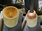 5. Using this cone-shaped hardwood cavity and the hydraulic press to push out the chin.