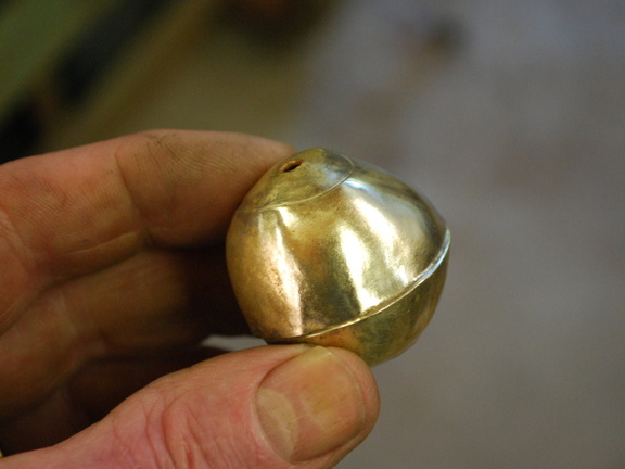 56. Jumping ahead a little, the ball has been formed and silver-soldered along the seams, albeit a little lopsided.