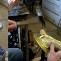 11. Using the ball stake shown on the left with the heavy planishing hammer to fill out the form of the head.
