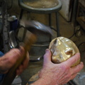12. More hammering, on the front of the ears, using the same tool trhat was used with the press.