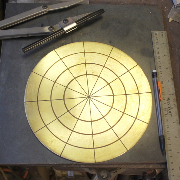 1. Starting with an 8.5 inch 16 gauge brass circle, annealed.