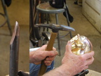 17. More work on the ear, getting it more elongated, using the stake shown on the left.