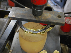 14. Pressing the form with the hydraulic press, on a polyurethane block.