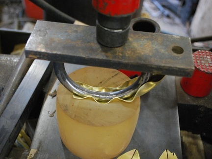 14. Pressing the form with the hydraulic press, on a polyurethane block.